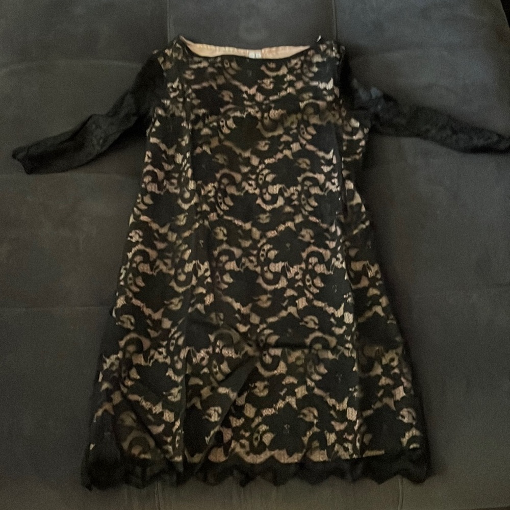 Black lace dress lined except sleeves, small, perfect condition. So cute.